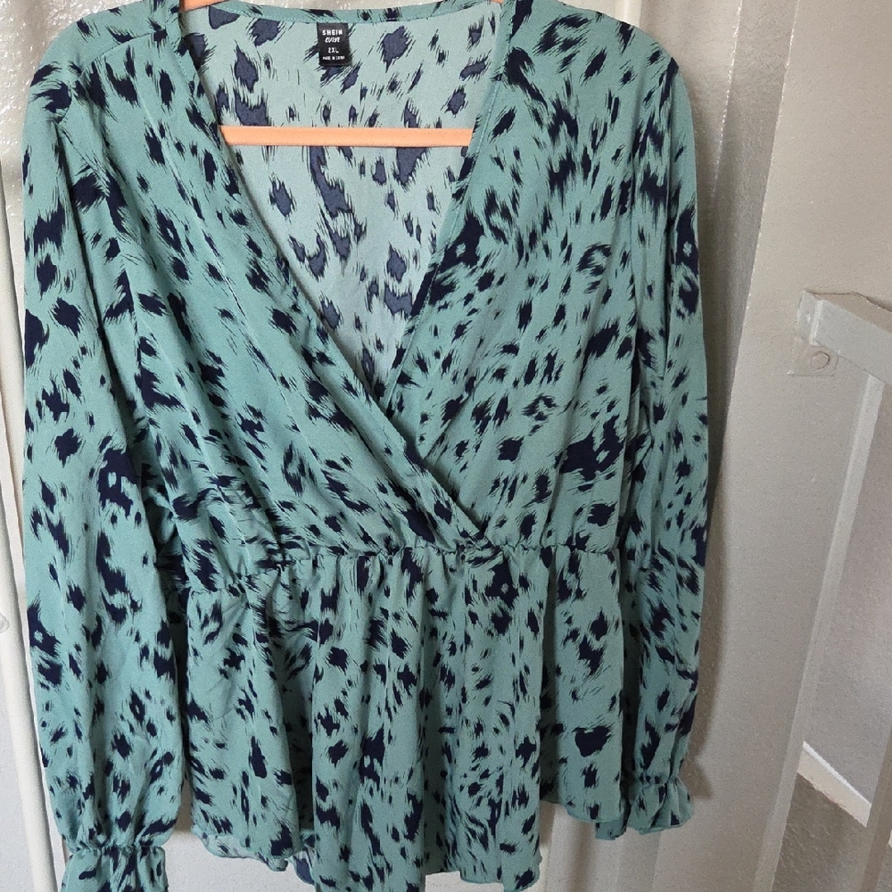 Chic Teal and Blue Patterned Blouse
